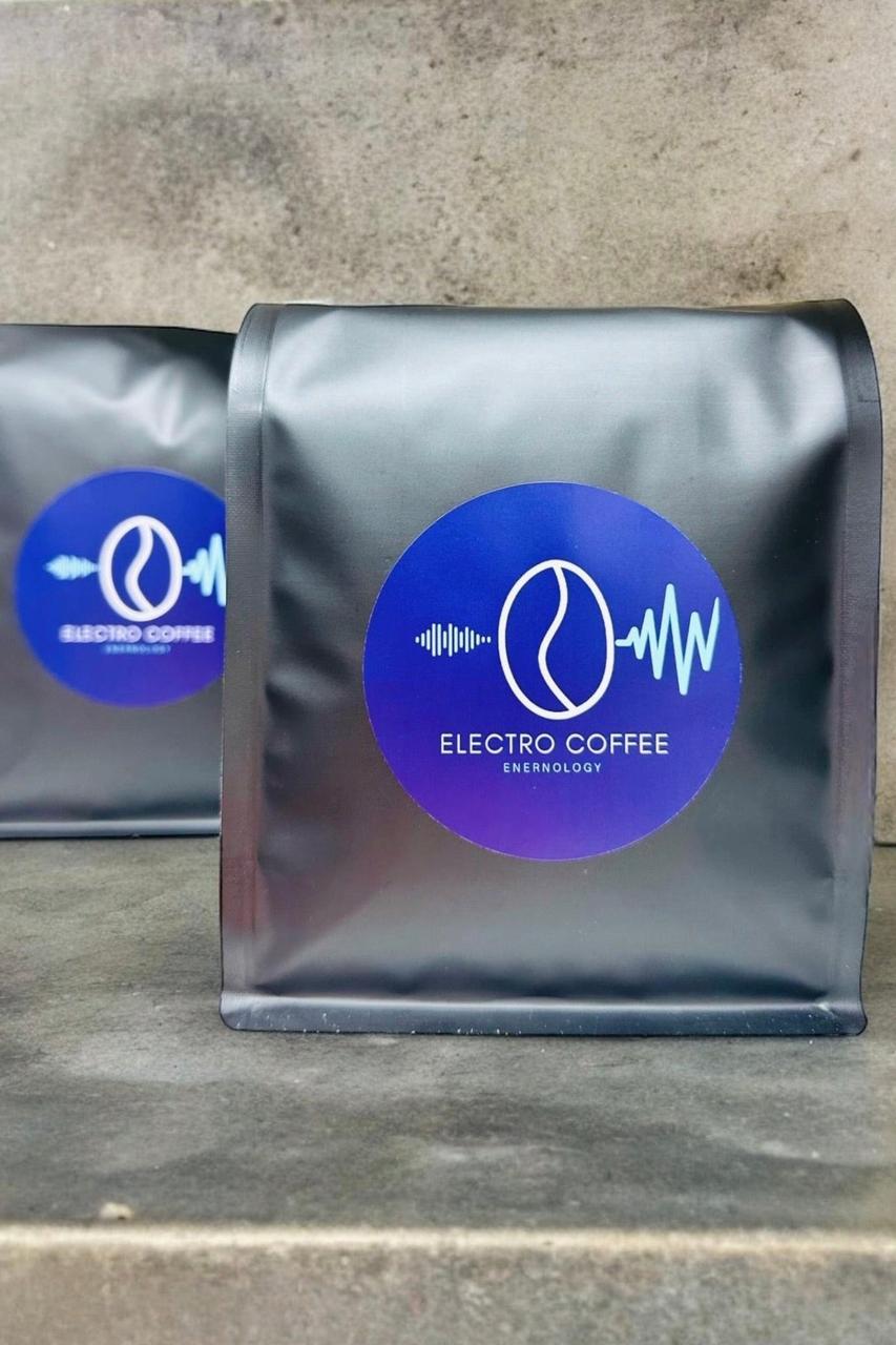 Two matte gray coffee bags with round blue and purple "Electro Coffee" labels.